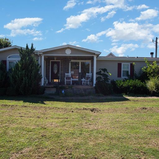 107 New Deal Potts Road Cottontown, TN 37048 - Photo 2 of 31 a front view of house with yard and entertaining space