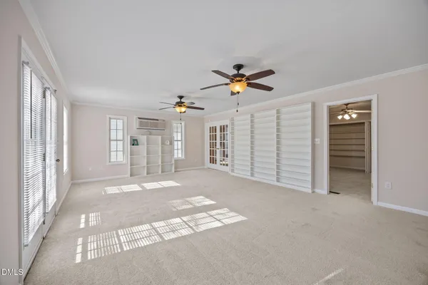 a view of hallway with windows