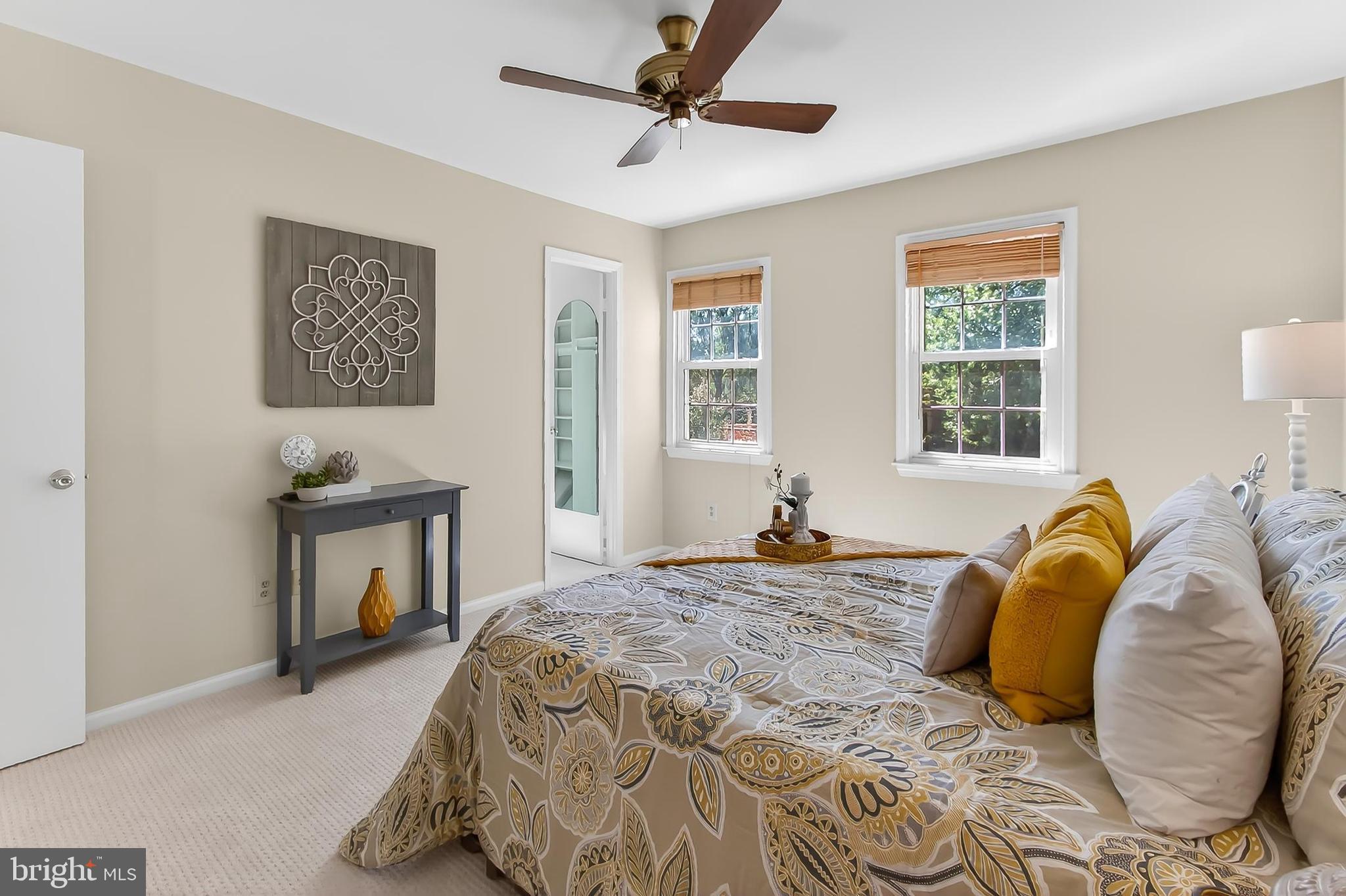2810 Andiron Lane Vienna, VA 22180 - Photo 18 of 37 a bedroom with a bed and a window