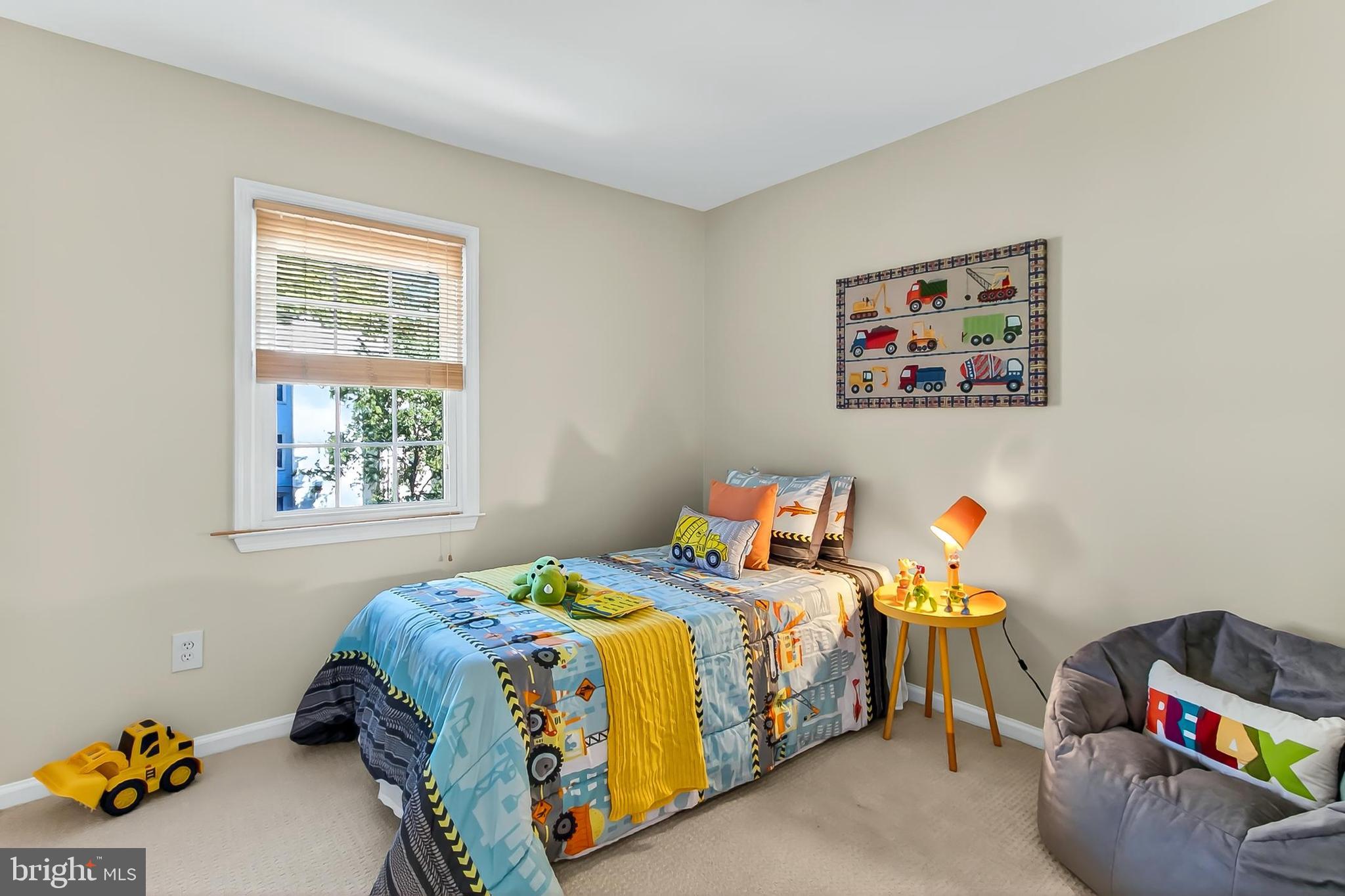 2810 Andiron Lane Vienna, VA 22180 - Photo 22 of 37 a bedroom with a bed and a window
