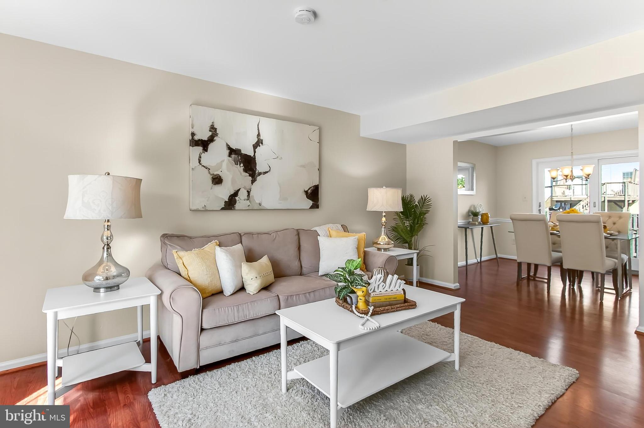 2810 Andiron Lane Vienna, VA 22180 - Photo 4 of 37 a living room with furniture and wooden floor