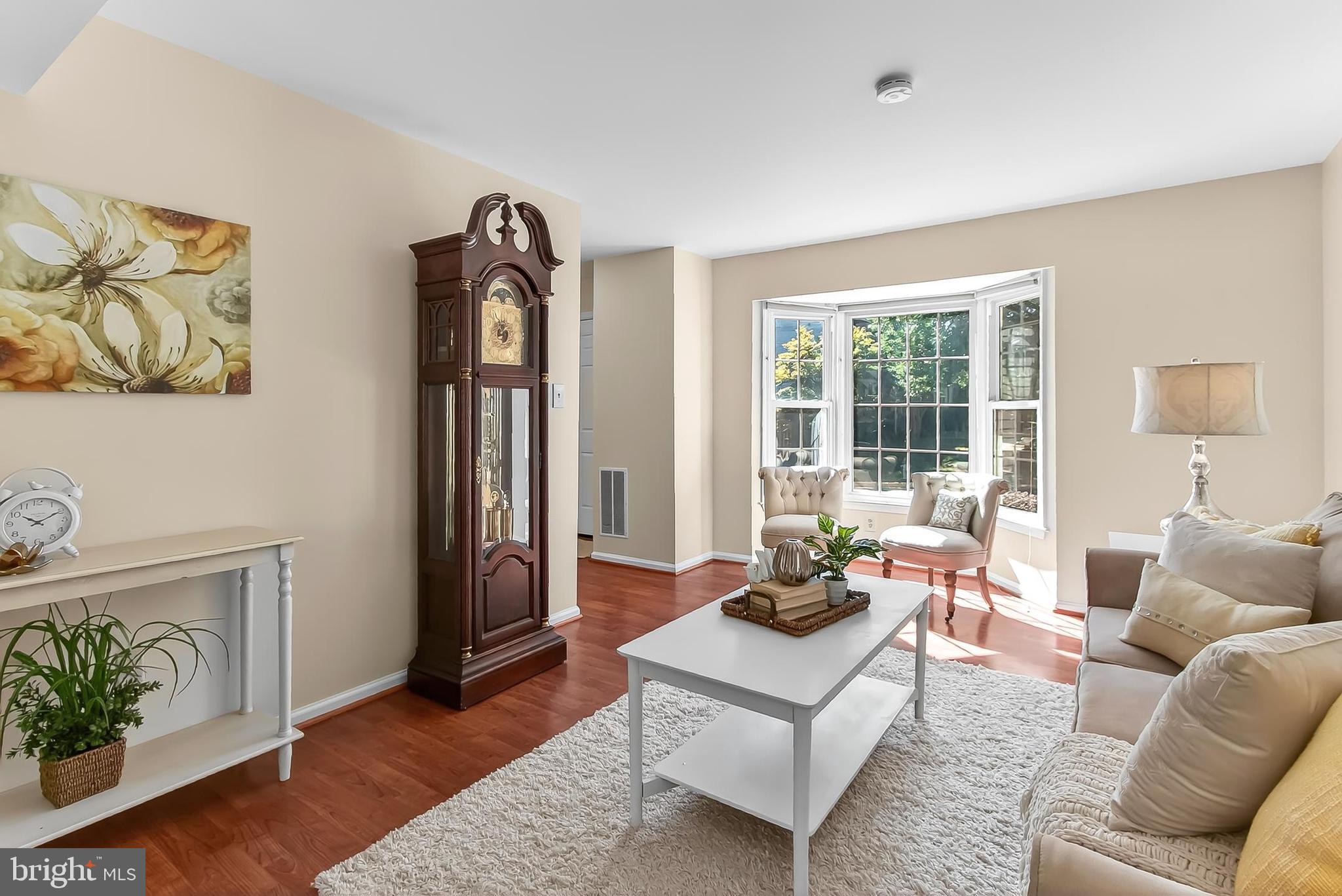2810 Andiron Lane Vienna, VA 22180 - Photo 5 of 37 a living room with furniture and a window
