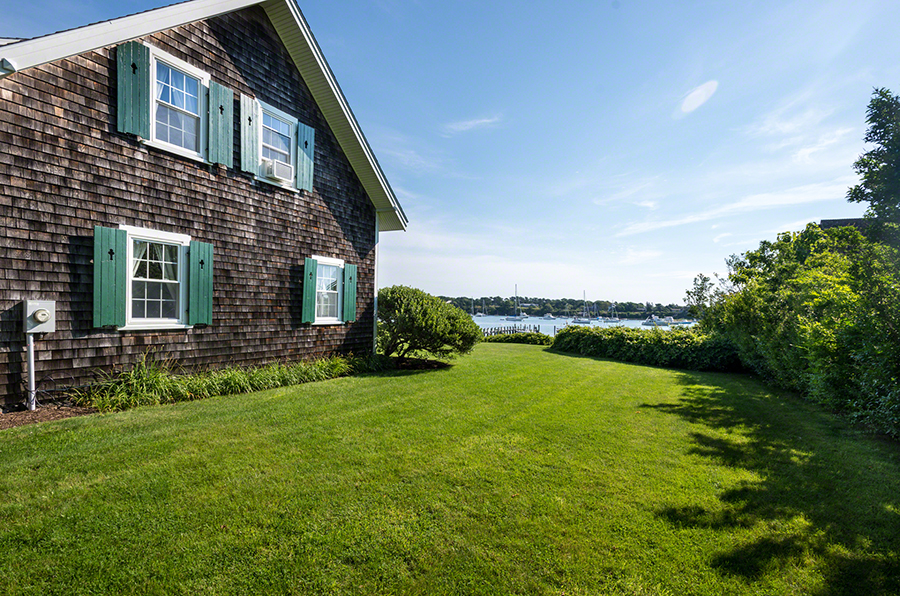 44 Green Hollow Road Edgartown, MA 02539 - Photo 12 of 45 a view of a patio with a yard