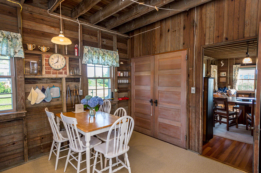 44 Green Hollow Road Edgartown, MA 02539 - Photo 21 of 45 a view of a dining room with furniture window and wooden floor