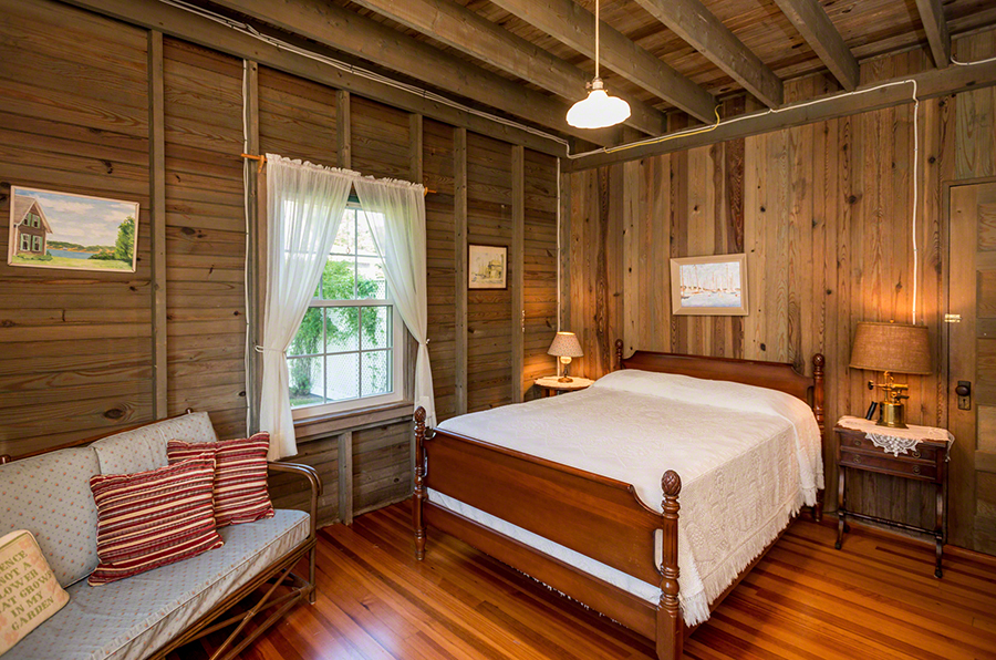 44 Green Hollow Road Edgartown, MA 02539 - Photo 26 of 45 a bed sitting in a spacious bedroom next to a window