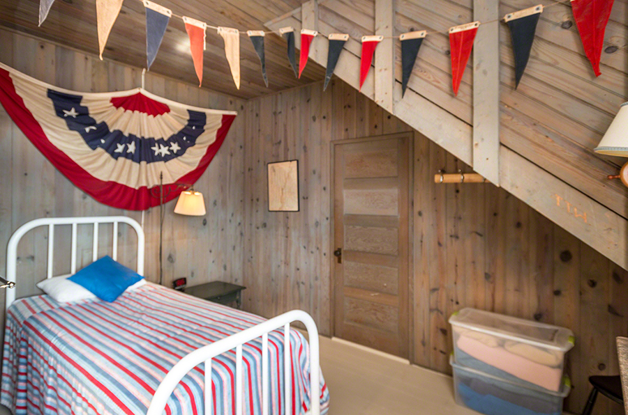 44 Green Hollow Road Edgartown, MA 02539 - Photo 32 of 45 a bedroom with a bed and a painting on the wall