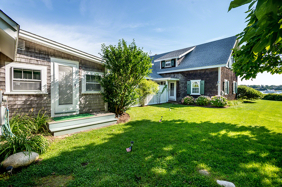 44 Green Hollow Road Edgartown, MA 02539 - Photo 41 of 45 a view of a house with a yard