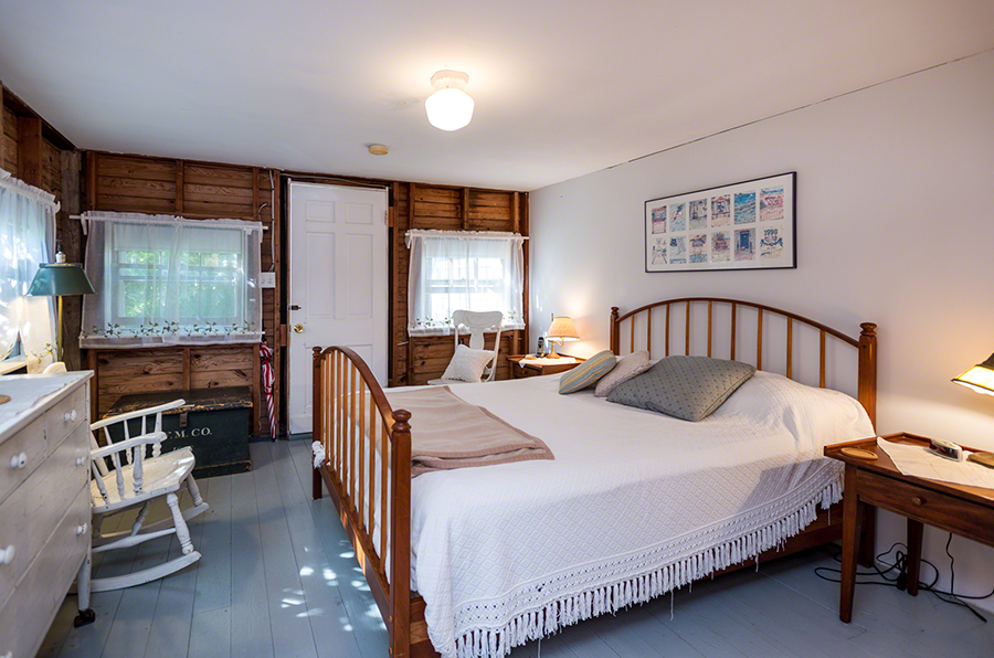 44 Green Hollow Road Edgartown, MA 02539 - Photo 42 of 45 a bedroom with a bed next to a window