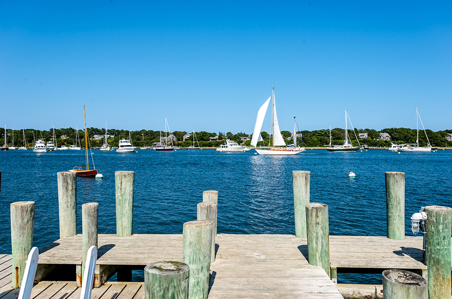 44 Green Hollow Road Edgartown, MA 02539 - Photo 6 of 45 a view of a terrace with chairs