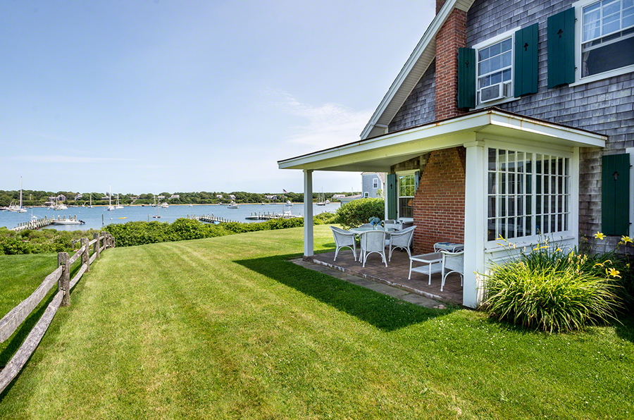 44 Green Hollow Road Edgartown, MA 02539 - Photo 9 of 45 a view of a house with a yard patio and swimming pool