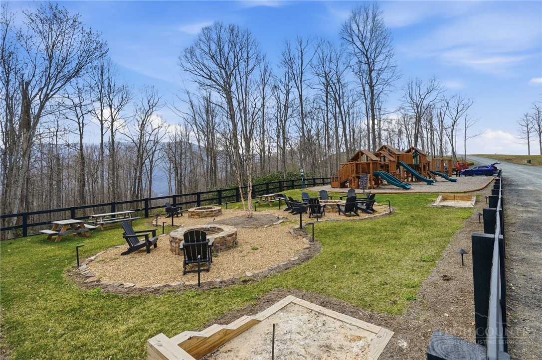Lot 191 Raspberry Lane Elk Park, NC 28622 - Photo 8 of 12 front view of a house with swimming pool and sitting area