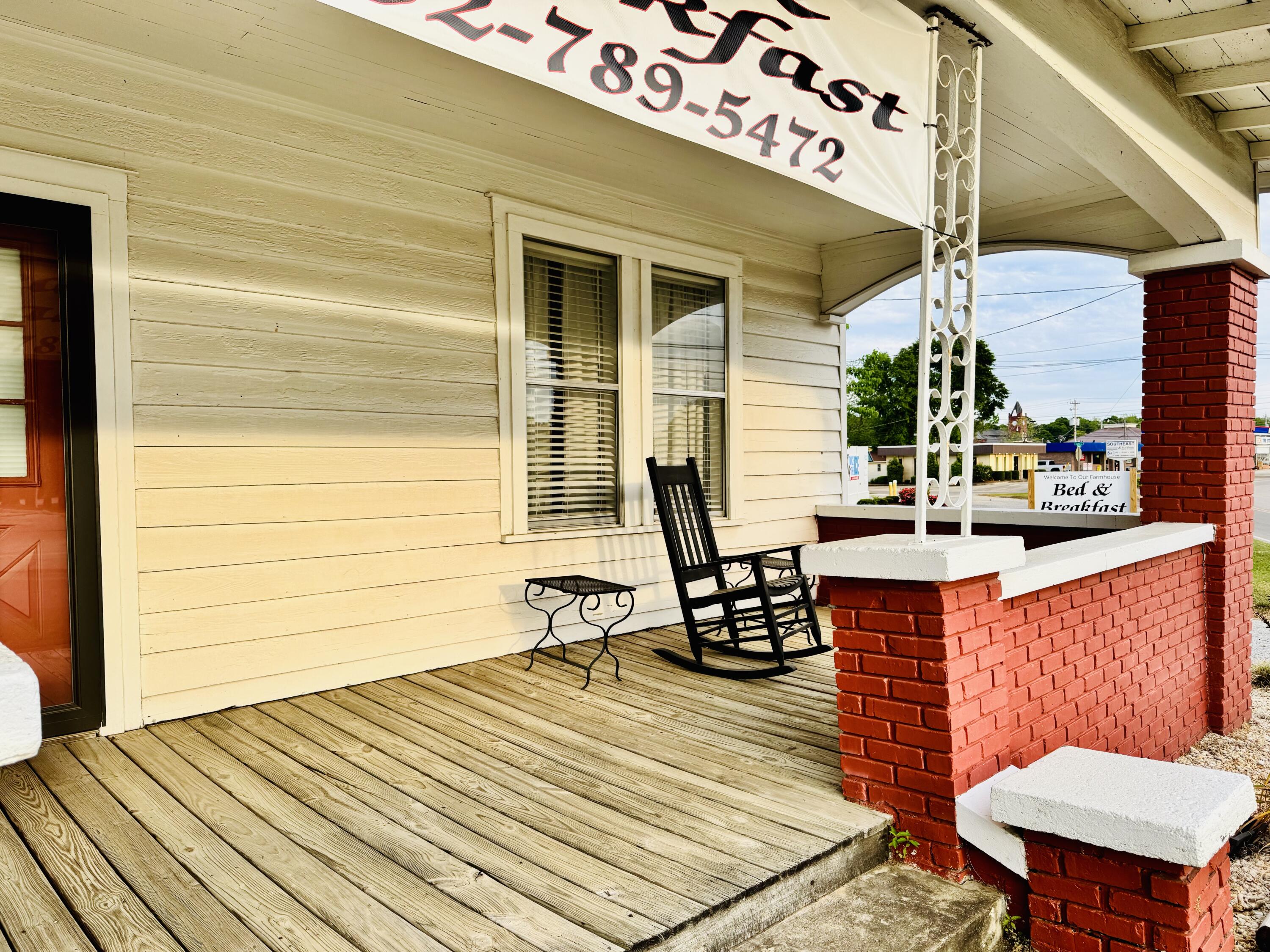472 Claxton Avenue Elba, AL 36323 - Photo 14 of 29 a outdoor seating area with blue lights