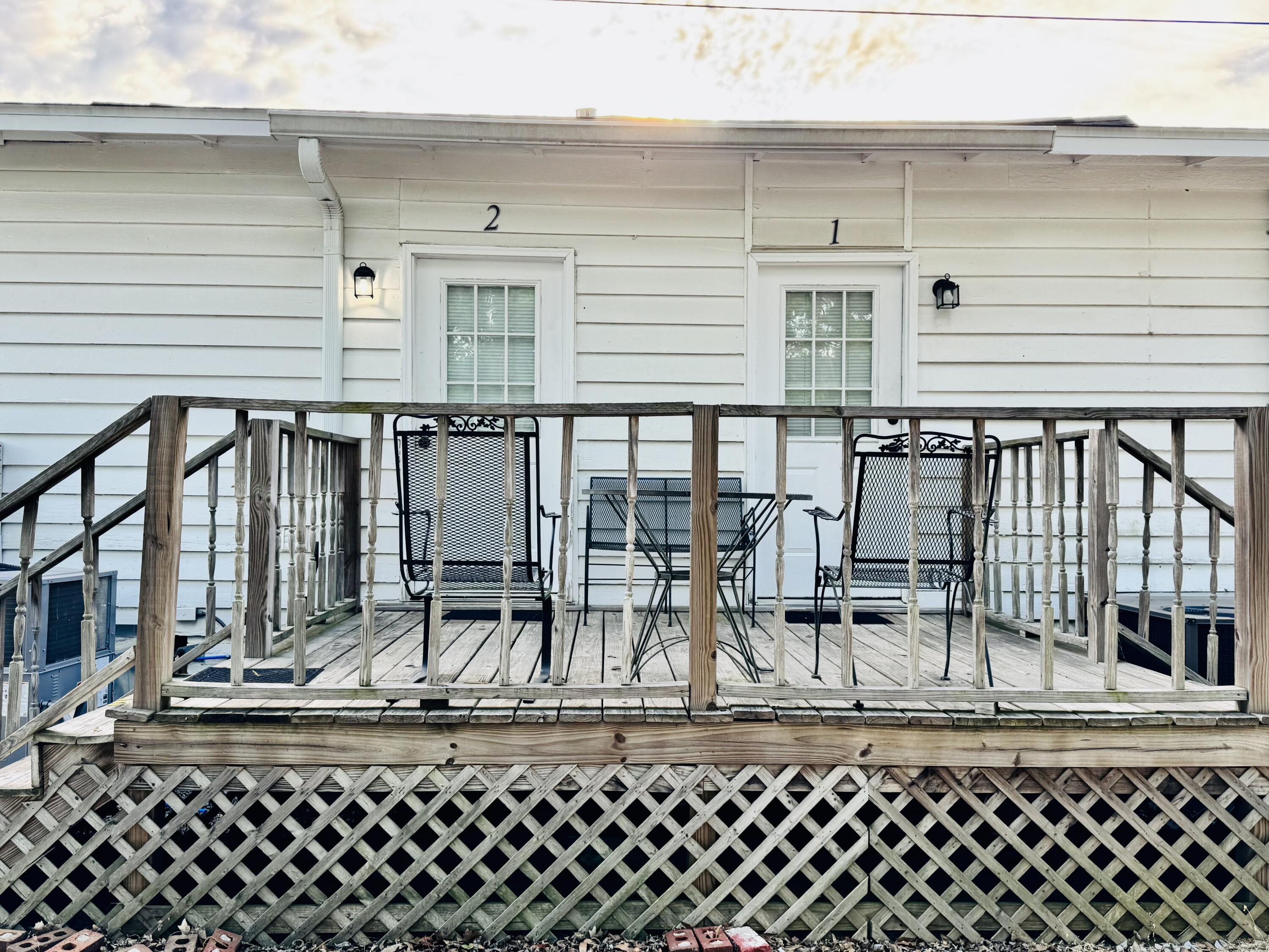472 Claxton Avenue Elba, AL 36323 - Photo 22 of 29 a view of a chair and tables in the patio