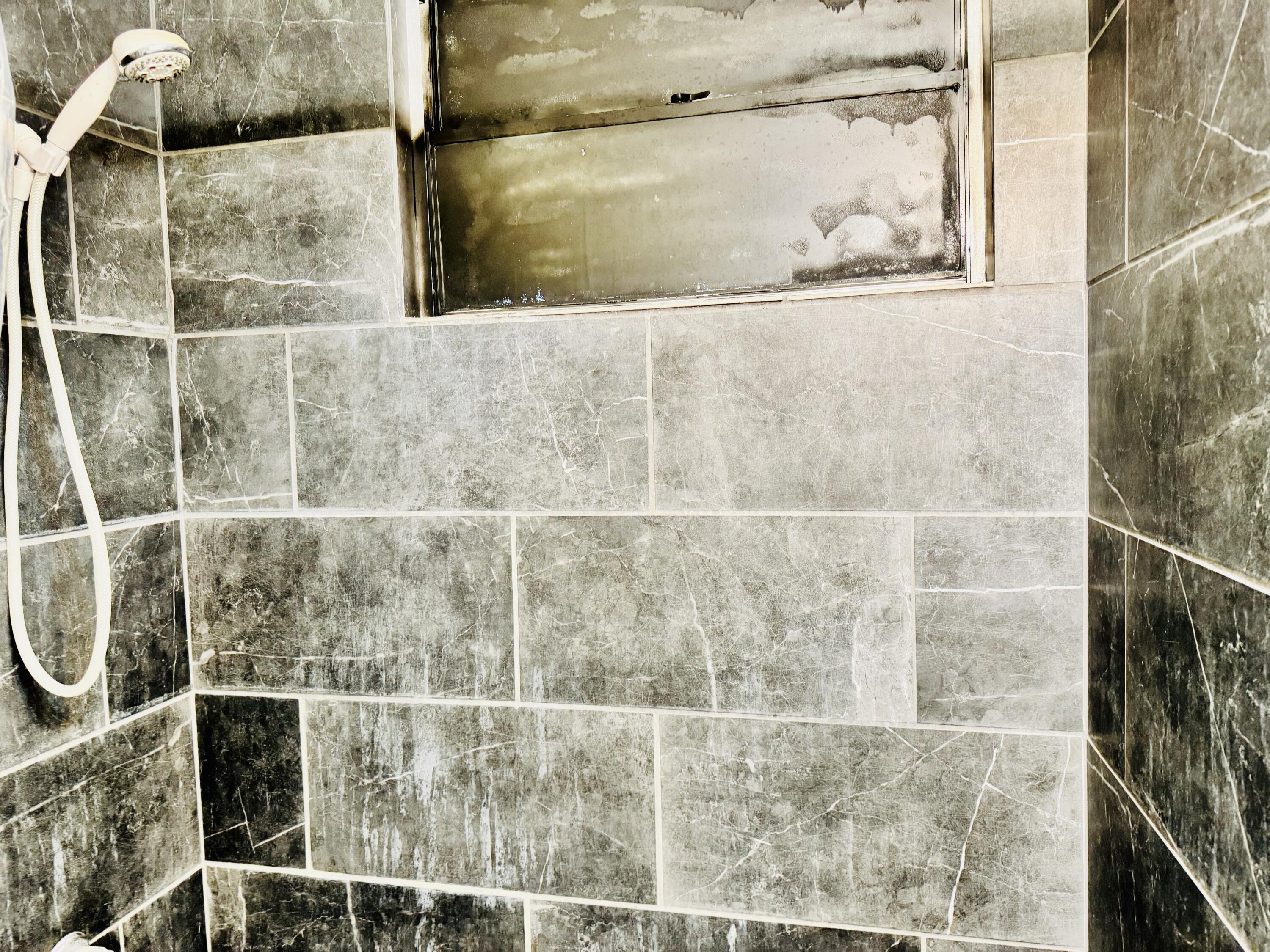 472 Claxton Avenue Elba, AL 36323 - Photo 5 of 29 a bathroom with a shower
