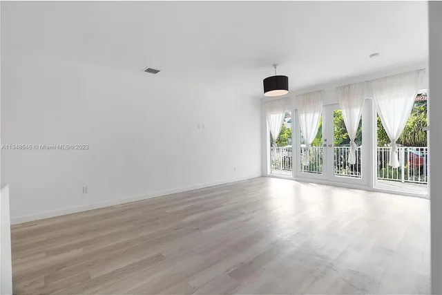 a kitchen with a stove and a microwave
