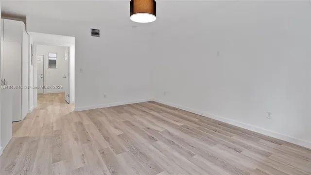a kitchen with a stove and a microwave