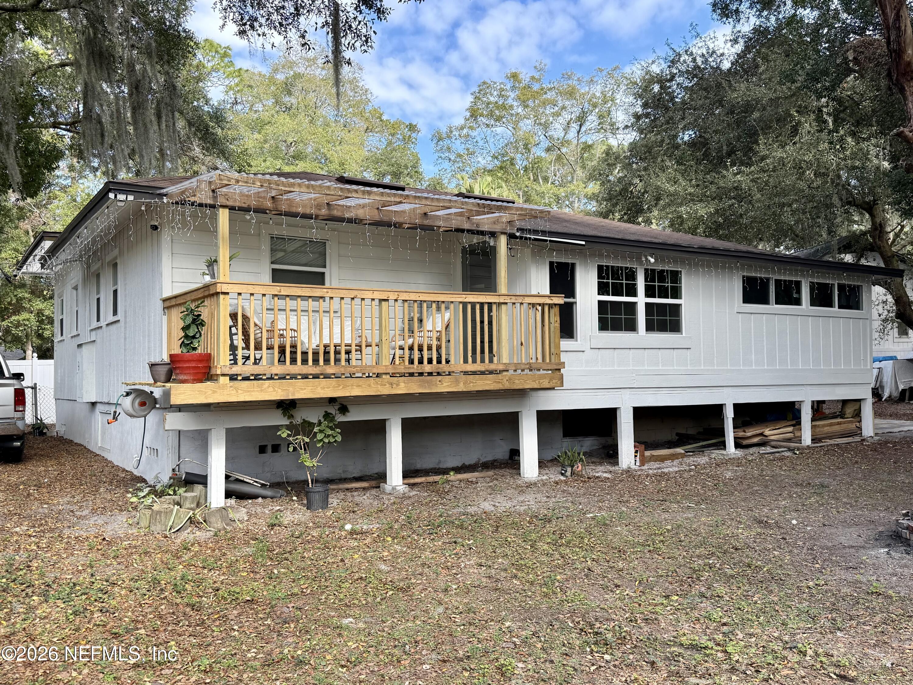 1953 Bartram Road Jacksonville, FL 32207 - Photo 19 of 25 a view of a house with a balcony and deck