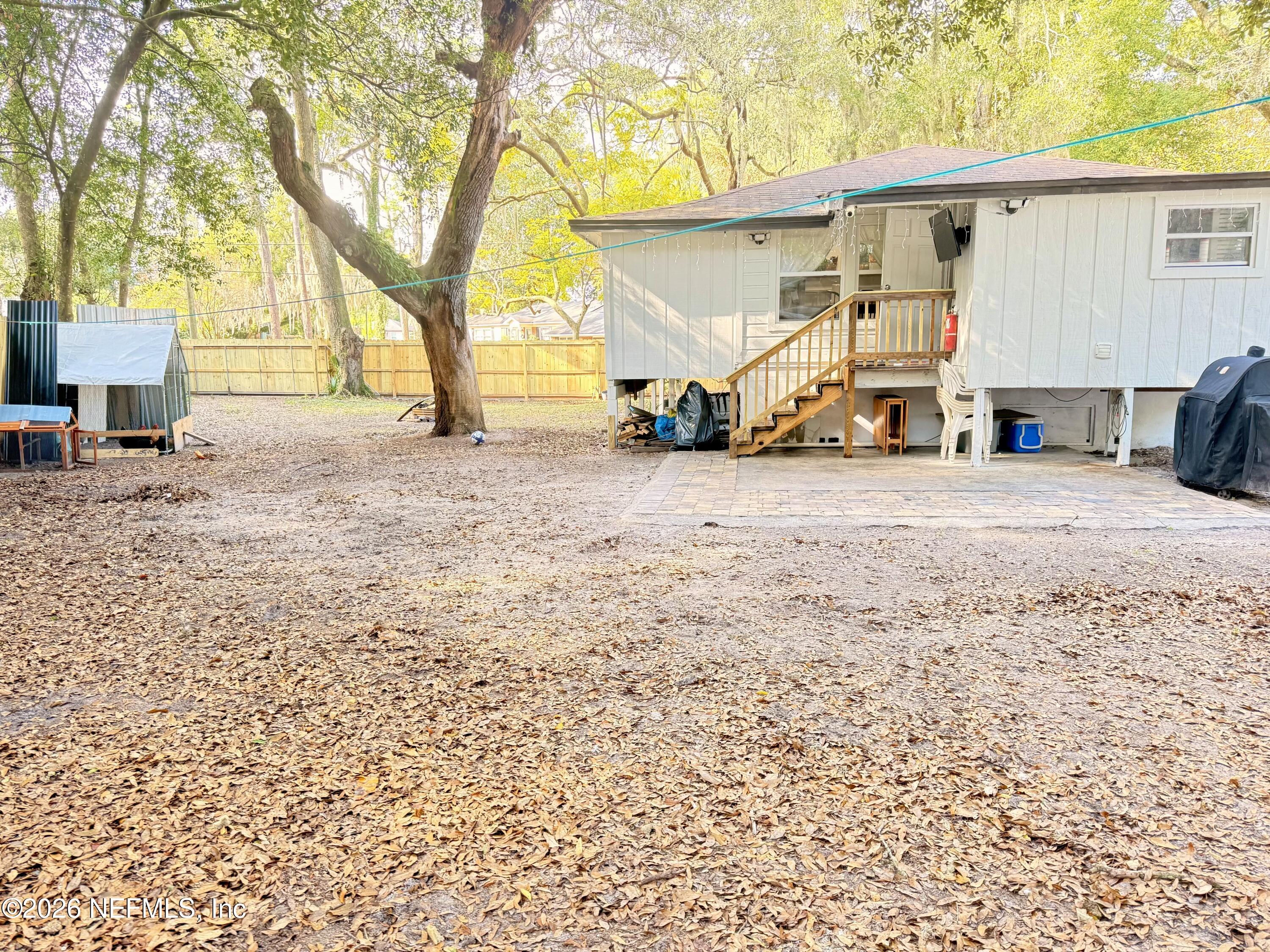 1953 Bartram Road Jacksonville, FL 32207 - Photo 22 of 25 a view of a house with a snow in the yard