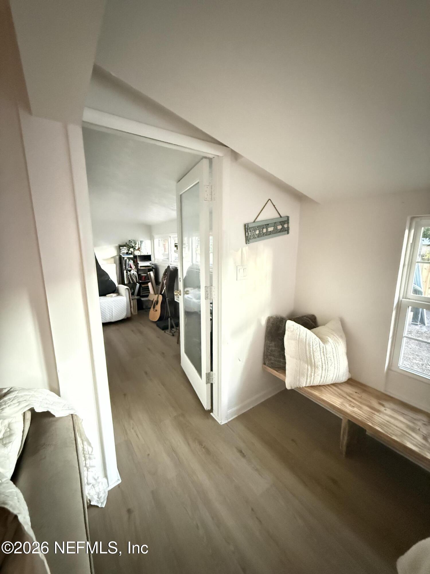 1953 Bartram Road Jacksonville, FL 32207 - Photo 5 of 25 a living room with furniture and a table