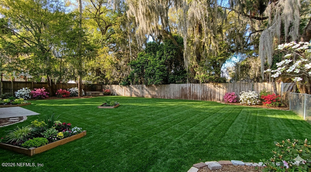 1283 Nantucket Avenue Atlantic Beach, FL 32233 - Photo 3 of 9 a garden view