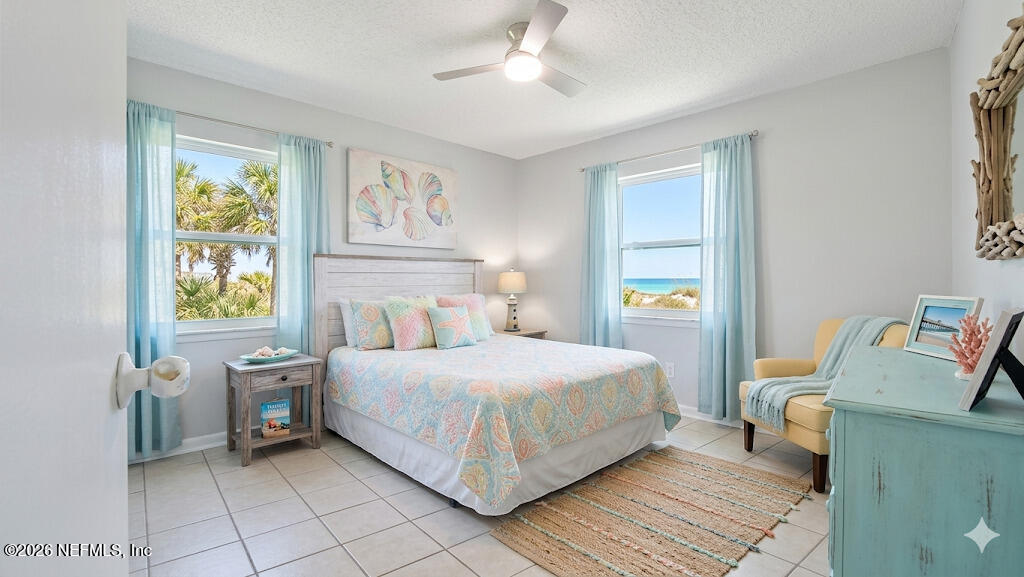 1283 Nantucket Avenue Atlantic Beach, FL 32233 - Photo 7 of 9 a bedroom with a bed and a window