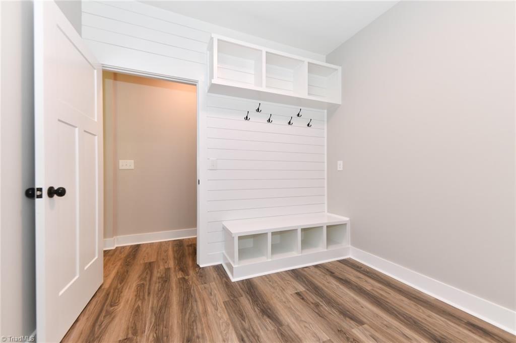 7900 Pate Drive Oak Ridge, NC 27310 - Photo 38 of 50 mudroom / dropzone laundry with custom built ins
