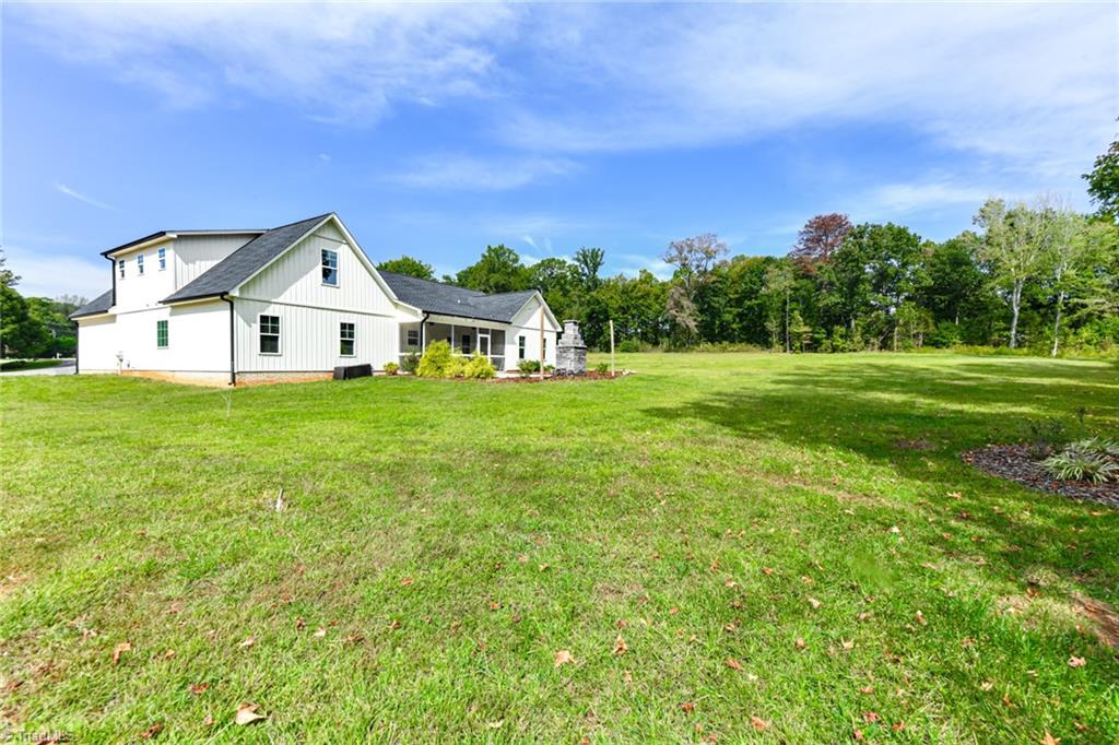 7900 Pate Drive Oak Ridge, NC 27310 - Photo 44 of 50 large, flat tree-lined lot at the end of the cul-du-sac