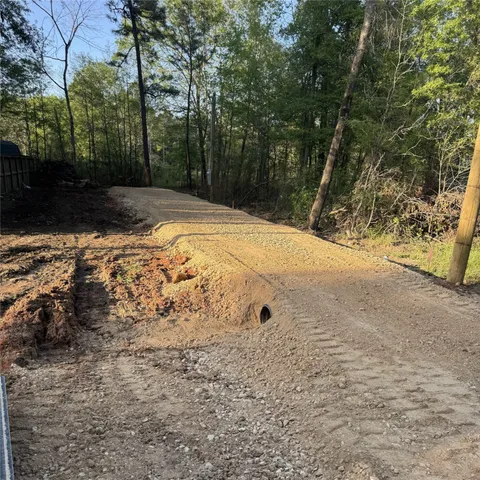 a view of a backyard of a house