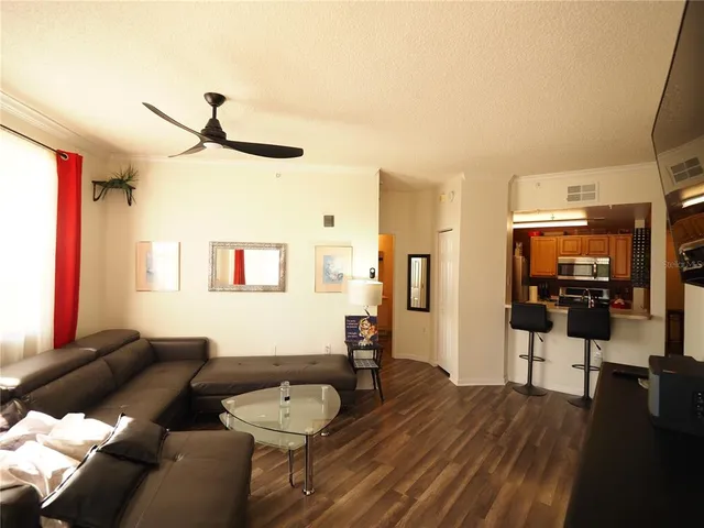 a view of a balcony with furniture