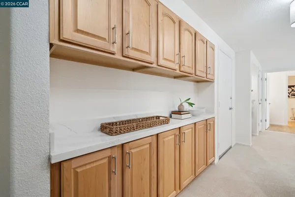 a kitchen with stainless steel appliances granite countertop a sink and cabinets