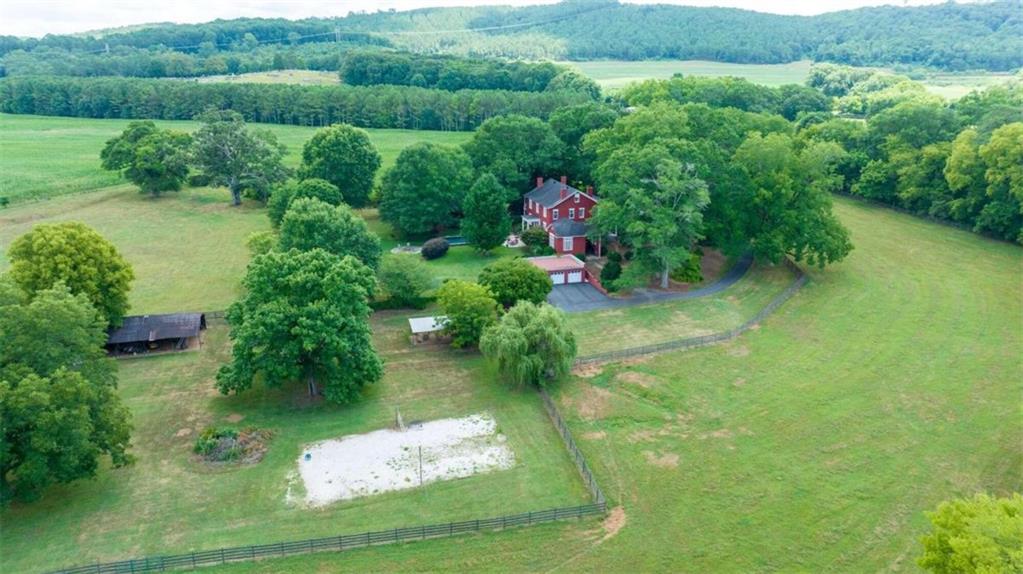 35 Rome Street Cave Spring, GA 30124 - Photo 1 of 1 a view of a garden with a lake