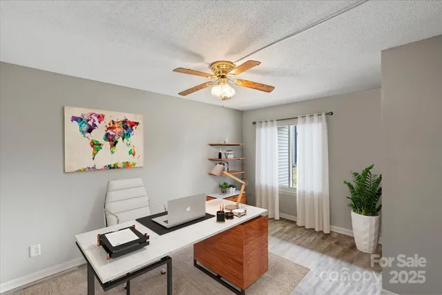a living room with furniture and window