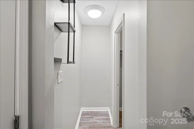 a view of elevator with wooden floor