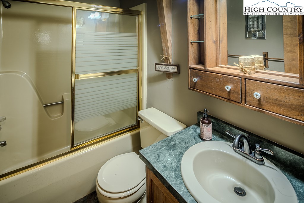 35 Maple Drive, Unit B Banner Elk, NC 28604 - Photo 21 of 21 a bathroom with a sink toilet and shower