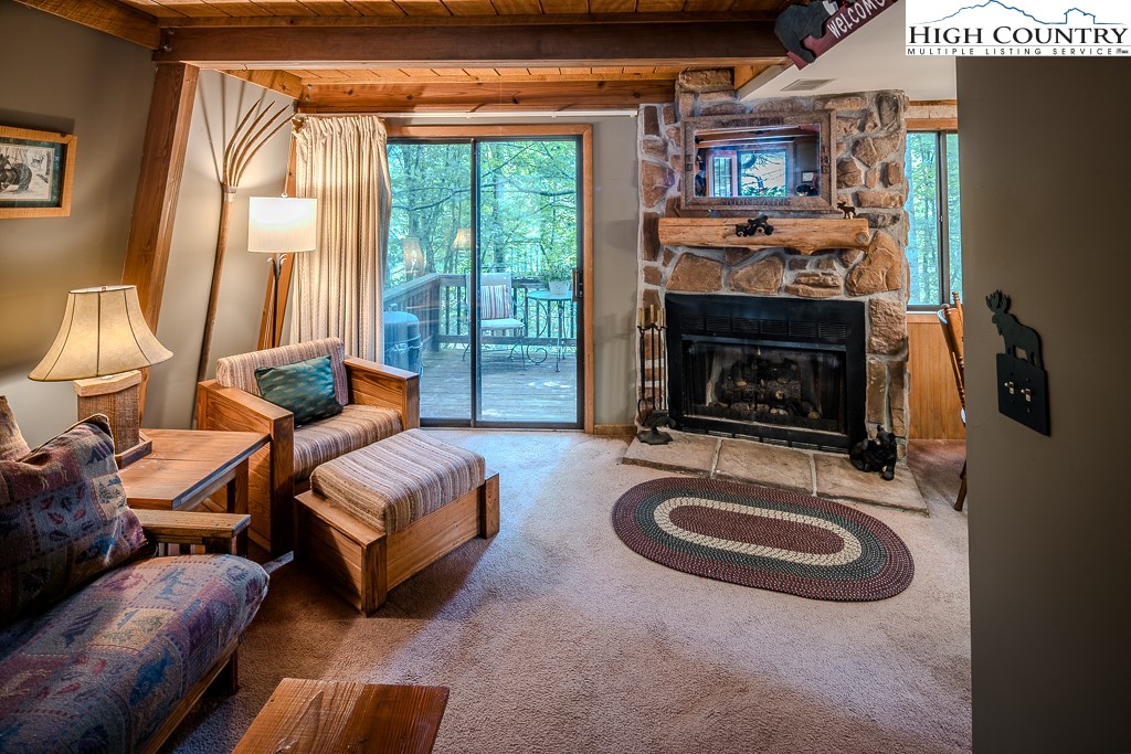 35 Maple Drive, Unit B Banner Elk, NC 28604 - Photo 3 of 21 a living room with furniture and a fireplace