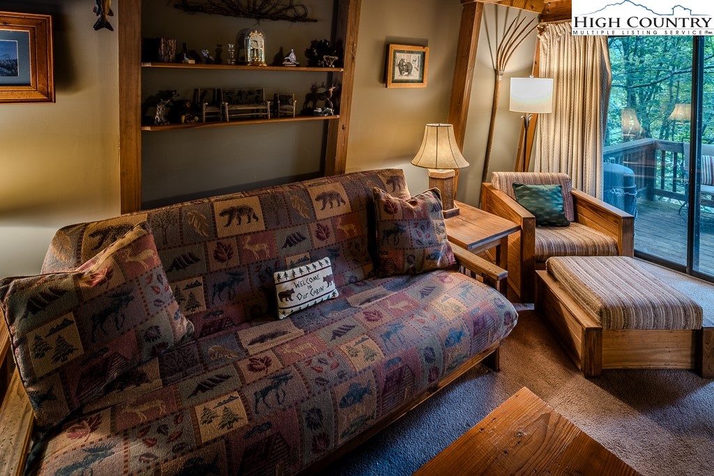 35 Maple Drive, Unit B Banner Elk, NC 28604 - Photo 4 of 21 a bedroom with bed and wooden floor