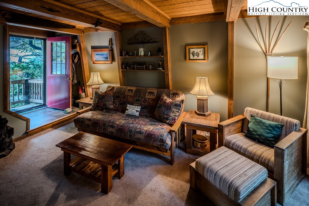35 Maple Drive, Unit B Banner Elk, NC 28604 - Photo 5 of 21 a living room with furniture and a window