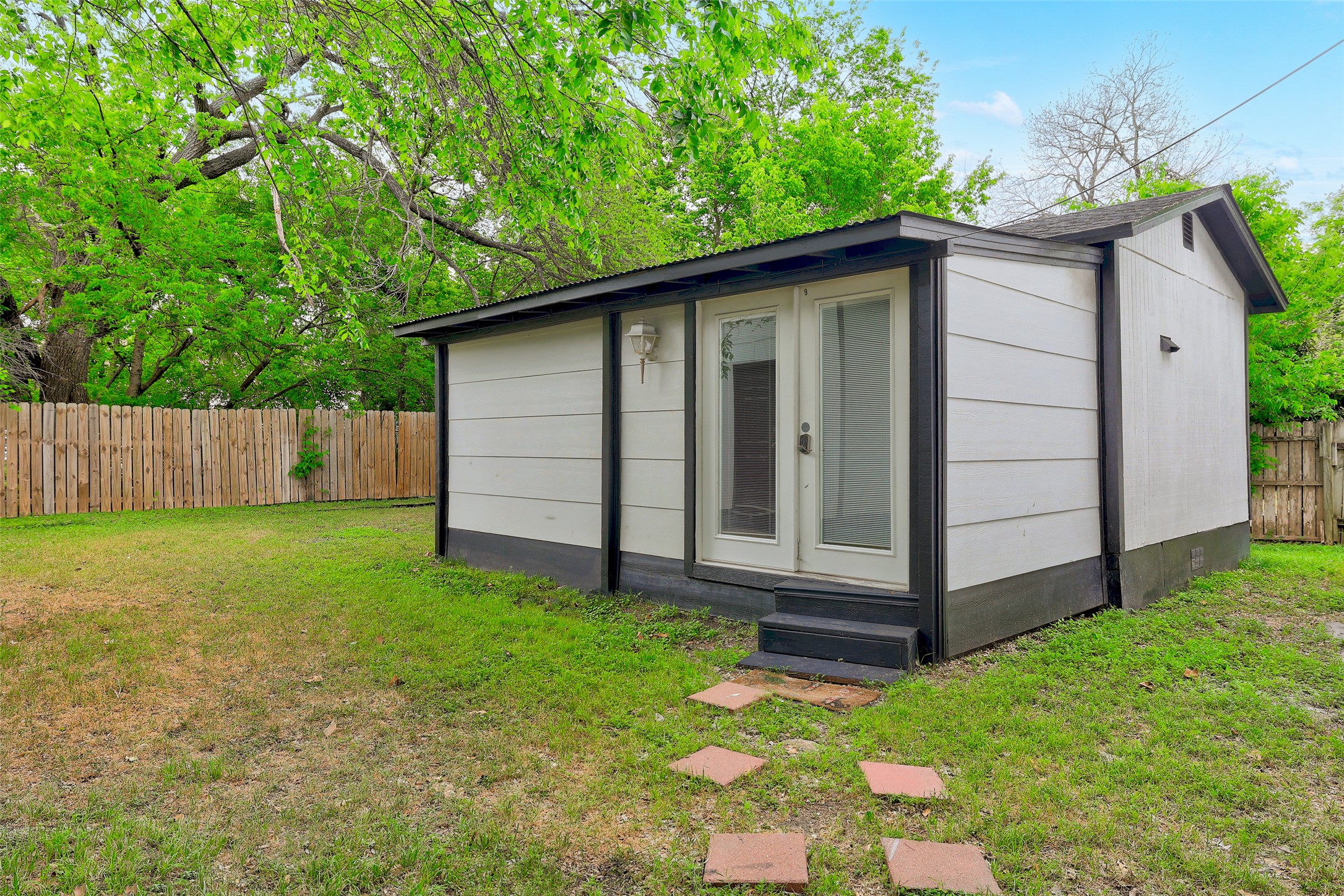 6307 Chesterfield Avenue Austin, TX 78752 - Photo 13 of 20 a view of a backyard with a garden