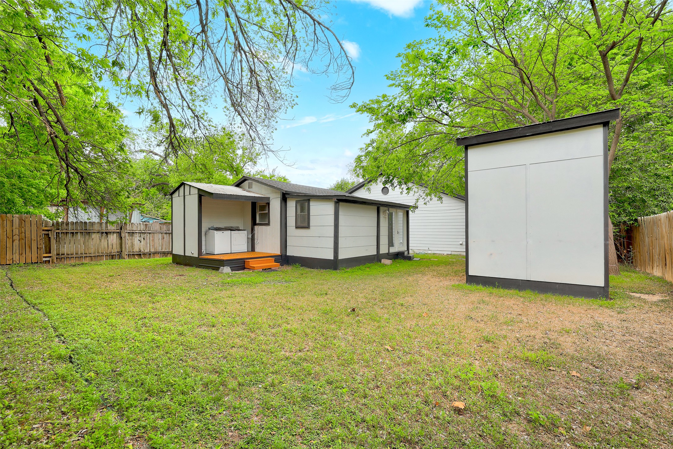 6307 Chesterfield Avenue Austin, TX 78752 - Photo 19 of 20 a view of a house with a backyard