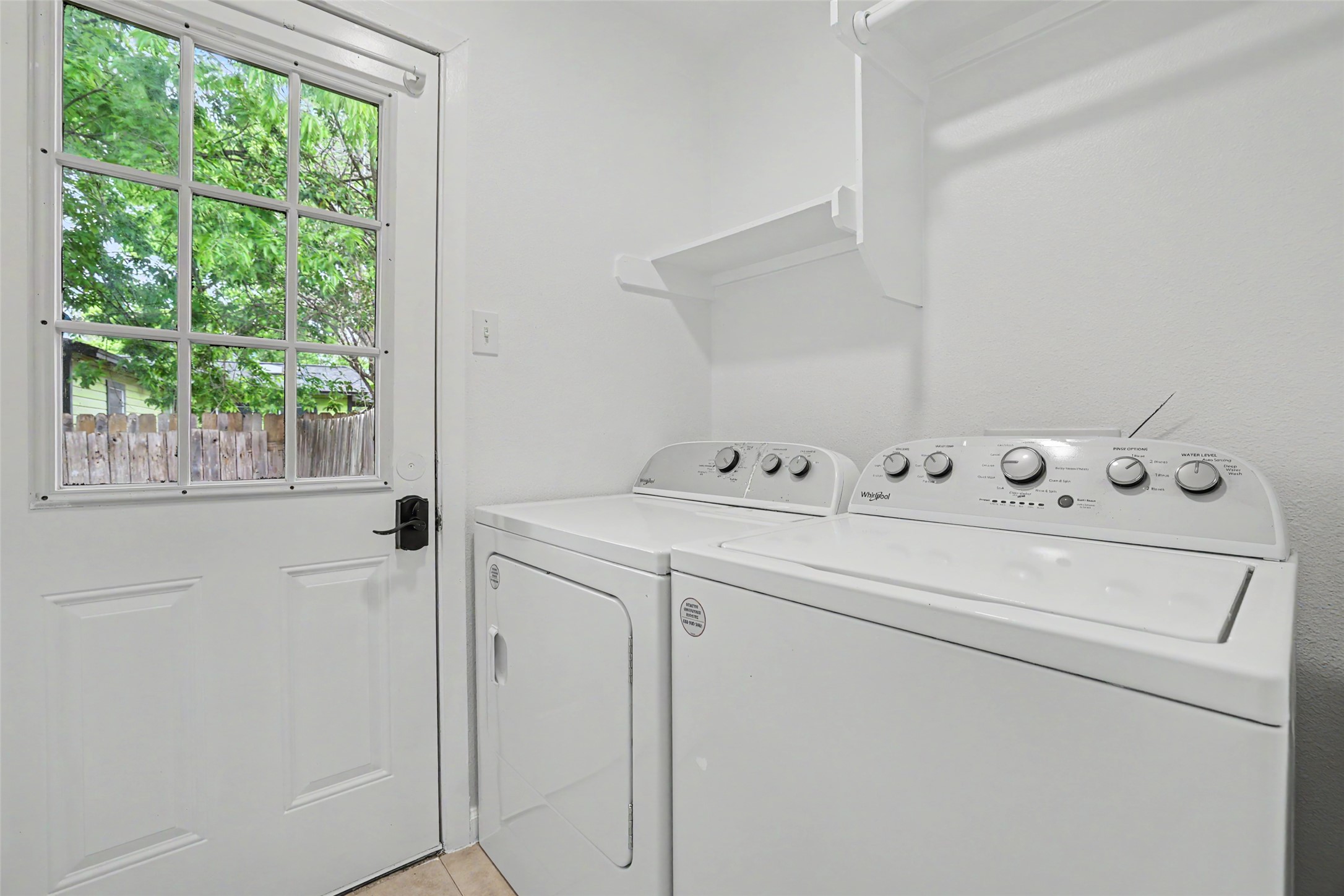 6307 Chesterfield Avenue Austin, TX 78752 - Photo 9 of 20 a utility room with dryer and washer