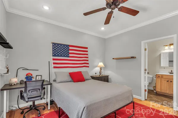 a bathroom with a sink toilet a shower and a mirror