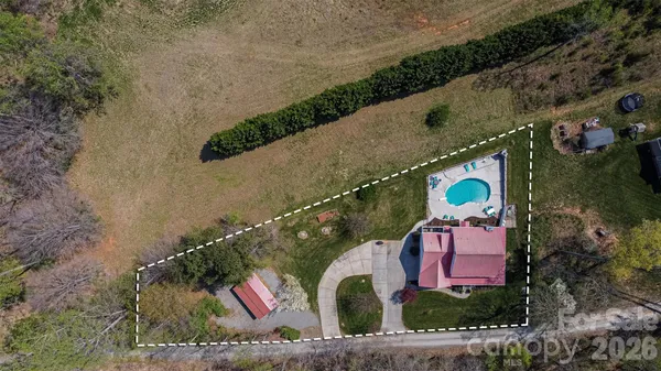an aerial view of residential house with outdoor space