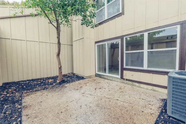 a view of a backyard of a house