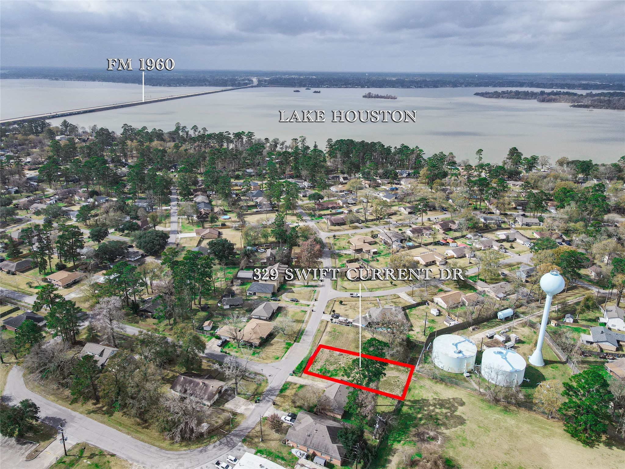 329 Swift Current Drive Huffman, TX 77336 - Photo 1 of 12 a view of a city