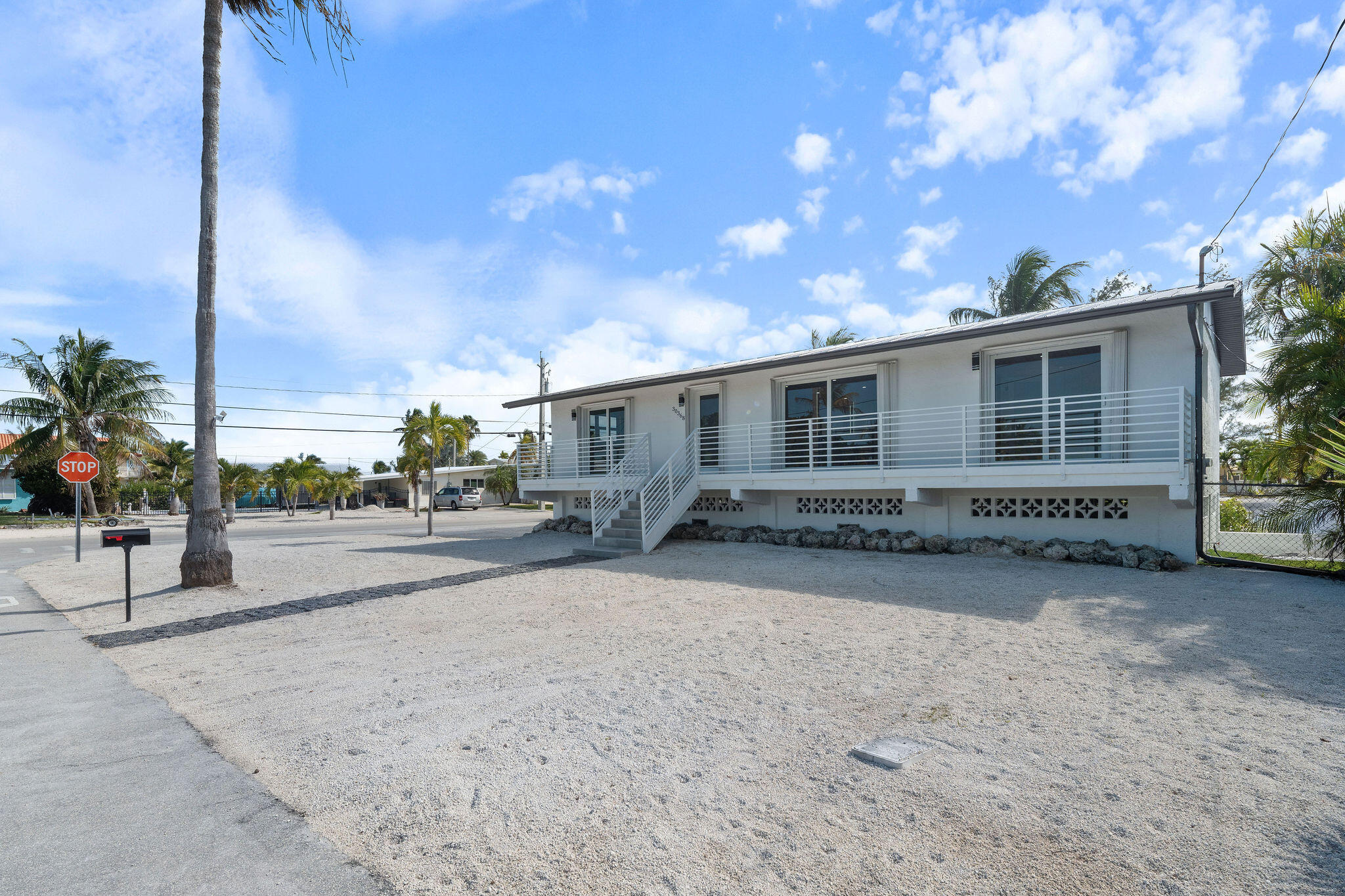 30368 Killdeer Lane Big Pine Key, FL 33043 - Photo 12 of 59 a view of a house with a patio