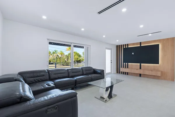 a kitchen with kitchen island granite countertop a sink and counter space