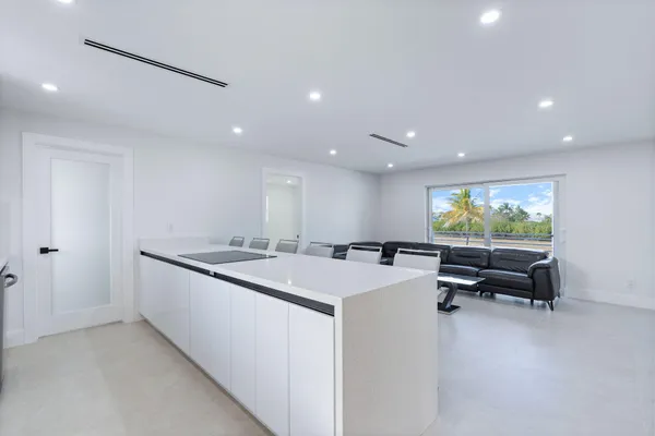 a bedroom with a bed and a shower