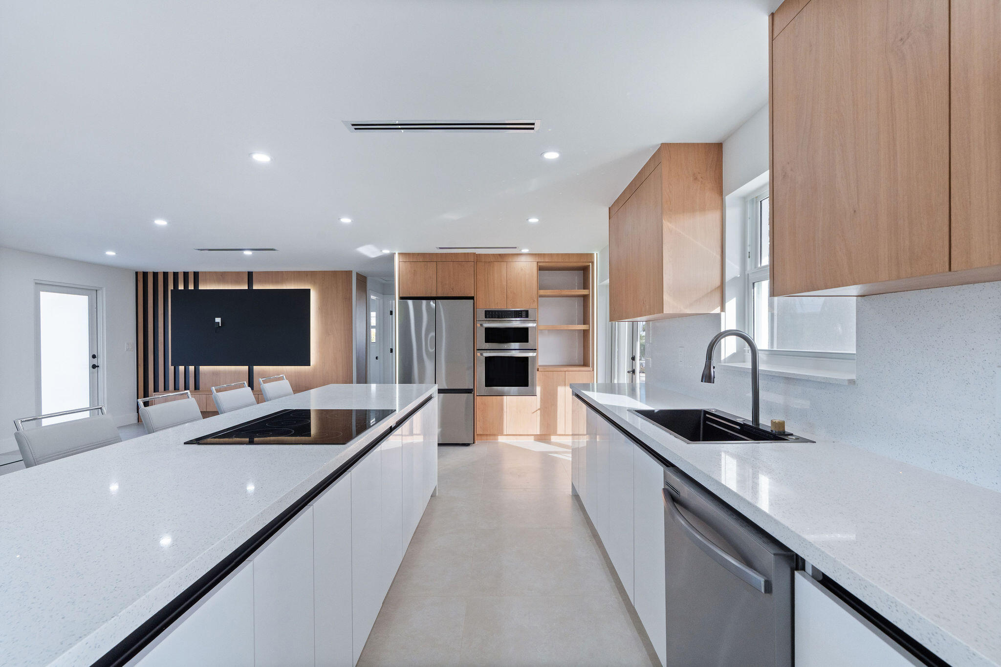 30368 Killdeer Lane Big Pine Key, FL 33043 - Photo 41 of 59 a large kitchen with stainless steel appliances a sink a stove and a refrigerator