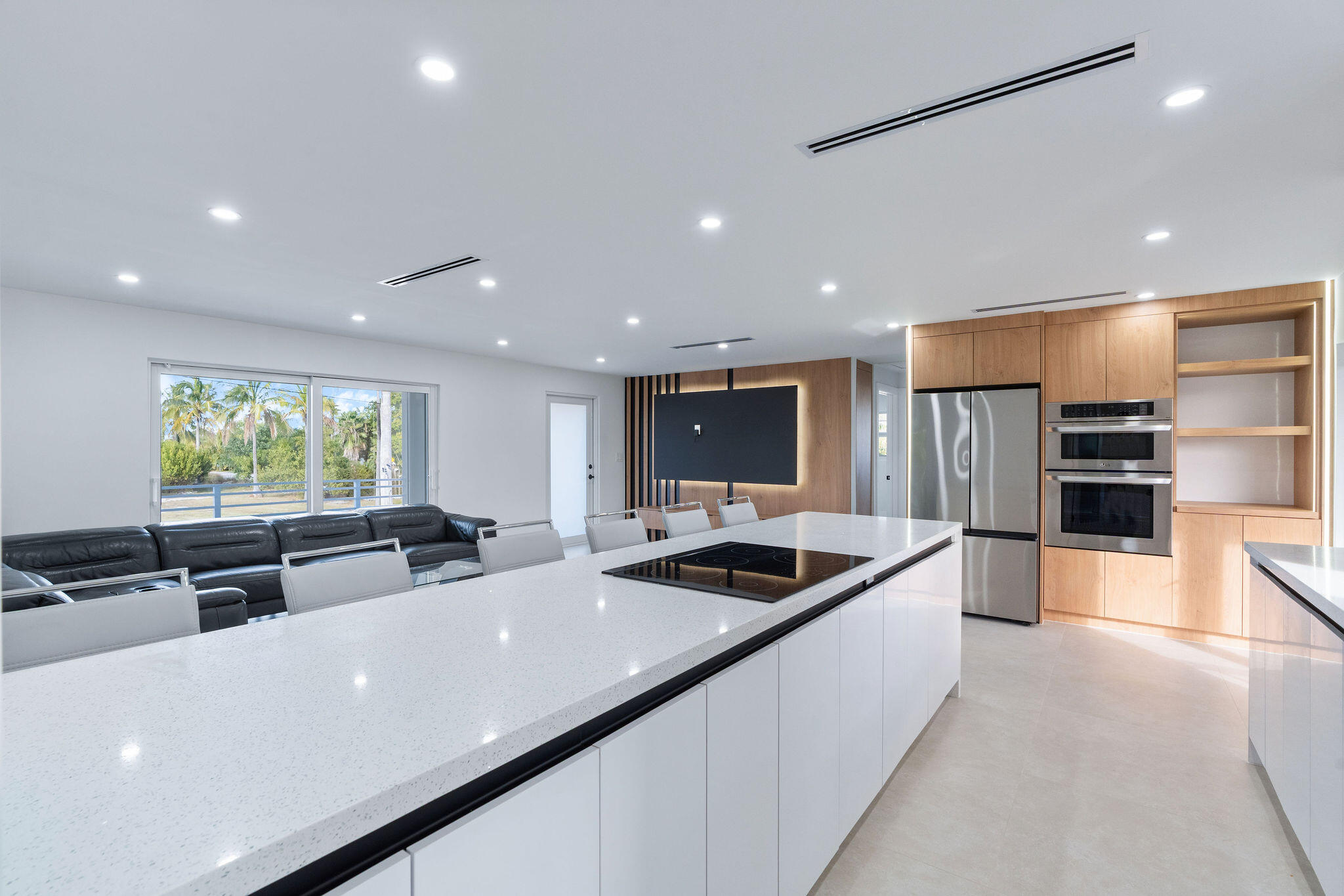 30368 Killdeer Lane Big Pine Key, FL 33043 - Photo 42 of 59 a kitchen with stainless steel appliances a sink a counter top space cabinets and a window