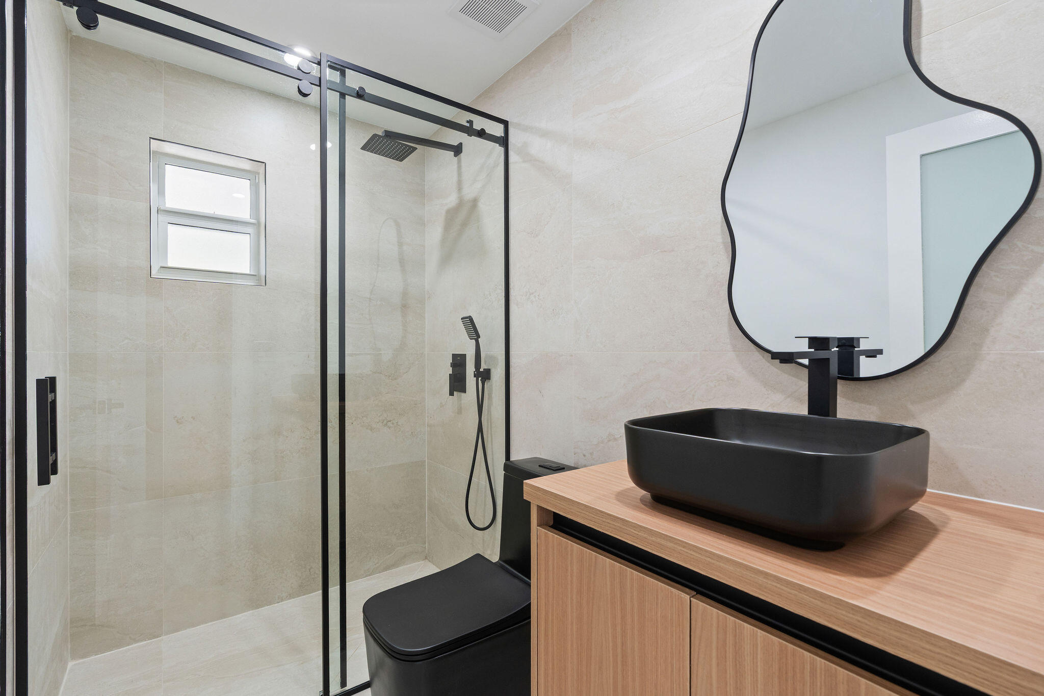 30368 Killdeer Lane Big Pine Key, FL 33043 - Photo 45 of 59 a bathroom with a sink a toilet and shower